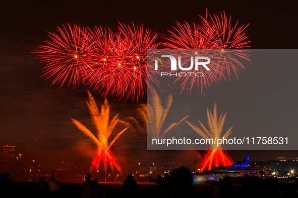 Fireworks illuminate the sky in Doha, Qatar, on November 9, 2024, on the last day of the inaugural Qatar Boat Show 2024 at Old Doha Port. Th...