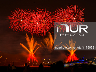 Fireworks illuminate the sky in Doha, Qatar, on November 9, 2024, on the last day of the inaugural Qatar Boat Show 2024 at Old Doha Port. Th...