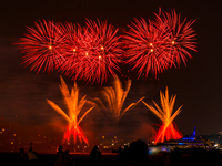 Fireworks illuminate the sky in Doha, Qatar, on November 9, 2024, on the last day of the inaugural Qatar Boat Show 2024 at Old Doha Port. Th...