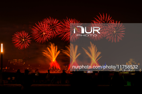 Fireworks illuminate the sky in Doha, Qatar, on November 9, 2024, on the last day of the inaugural Qatar Boat Show 2024 at Old Doha Port. Th...