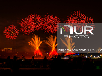 Fireworks illuminate the sky in Doha, Qatar, on November 9, 2024, on the last day of the inaugural Qatar Boat Show 2024 at Old Doha Port. Th...