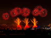 Fireworks illuminate the sky in Doha, Qatar, on November 9, 2024, on the last day of the inaugural Qatar Boat Show 2024 at Old Doha Port. Th...