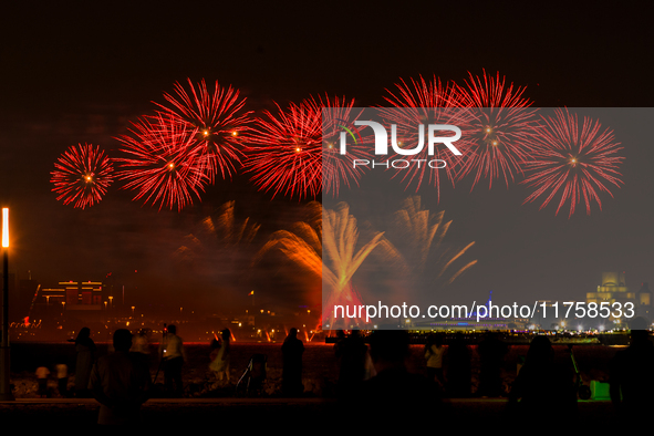 Fireworks illuminate the sky in Doha, Qatar, on November 9, 2024, on the last day of the inaugural Qatar Boat Show 2024 at Old Doha Port. Th...