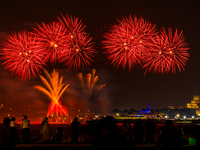 Fireworks illuminate the sky in Doha, Qatar, on November 9, 2024, on the last day of the inaugural Qatar Boat Show 2024 at Old Doha Port. Th...