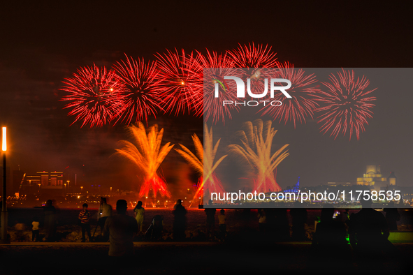 Fireworks illuminate the sky in Doha, Qatar, on November 9, 2024, on the last day of the inaugural Qatar Boat Show 2024 at Old Doha Port. Th...