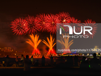 Fireworks illuminate the sky in Doha, Qatar, on November 9, 2024, on the last day of the inaugural Qatar Boat Show 2024 at Old Doha Port. Th...