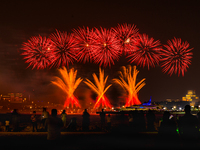 Fireworks illuminate the sky in Doha, Qatar, on November 9, 2024, on the last day of the inaugural Qatar Boat Show 2024 at Old Doha Port. Th...