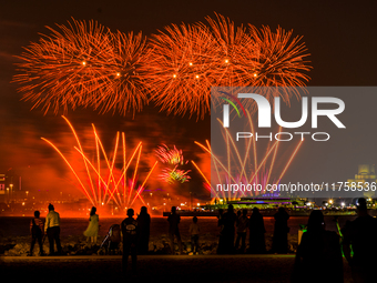 Fireworks illuminate the sky in Doha, Qatar, on November 9, 2024, on the last day of the inaugural Qatar Boat Show 2024 at Old Doha Port. Th...