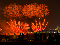 Fireworks illuminate the sky in Doha, Qatar, on November 9, 2024, on the last day of the inaugural Qatar Boat Show 2024 at Old Doha Port. Th...