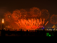 Fireworks illuminate the sky in Doha, Qatar, on November 9, 2024, on the last day of the inaugural Qatar Boat Show 2024 at Old Doha Port. Th...