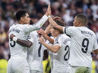 Real Madrid players (from left to right) Jude Bellingham, Vinicius Junior, Fran Garcia, and Kylian Mbappe celebrate a goal during the La Lig...