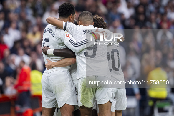 Real Madrid players (from left to right) Jude Bellingham, Kylian Mbappe, and Fran Garcia celebrate a goal during the La Liga EA Sports 2024/...