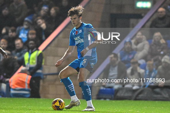 Oscar Wallin (5 Peterborough United) passes the ball during the Sky Bet League 1 match between Peterborough and Cambridge United at London R...