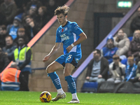 Oscar Wallin (5 Peterborough United) passes the ball during the Sky Bet League 1 match between Peterborough and Cambridge United at London R...