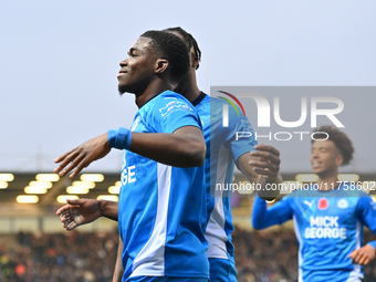 Kwame Poku (11 Peterborough United) celebrates after scoring the team's second goal during the Sky Bet League 1 match between Peterborough a...