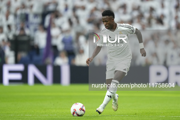 Vinicius Junior left winger of Real Madrid and Brazil during the La Liga match between Real Madrid CF and CA Osasuna at Estadio Santiago Ber...