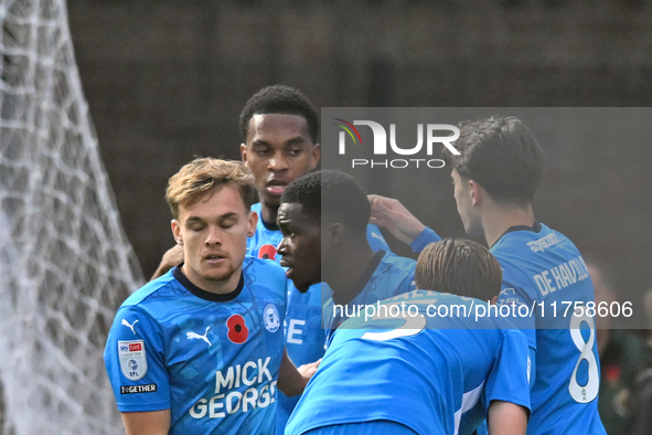 Kwame Poku (11 Peterborough United) (Center) celebrates after scoring the team's third goal during the Sky Bet League 1 match between Peterb...