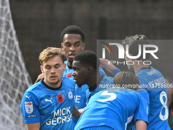 Kwame Poku (11 Peterborough United) (Center) celebrates after scoring the team's third goal during the Sky Bet League 1 match between Peterb...