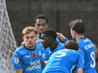 Kwame Poku (11 Peterborough United) (Center) celebrates after scoring the team's third goal during the Sky Bet League 1 match between Peterb...