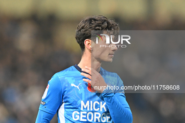 Joel Randall (14 Peterborough United) participates in the Sky Bet League 1 match between Peterborough and Cambridge United at London Road in...