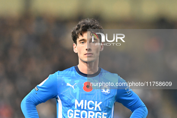 Joel Randall (14 Peterborough United) participates in the Sky Bet League 1 match between Peterborough and Cambridge United at London Road in...