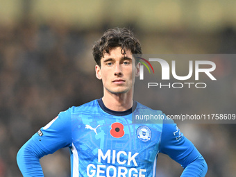 Joel Randall (14 Peterborough United) participates in the Sky Bet League 1 match between Peterborough and Cambridge United at London Road in...