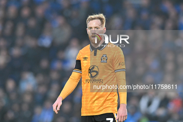 James Brophy (7 Cambridge United) looks on during the Sky Bet League 1 match between Peterborough and Cambridge United at London Road in Pet...