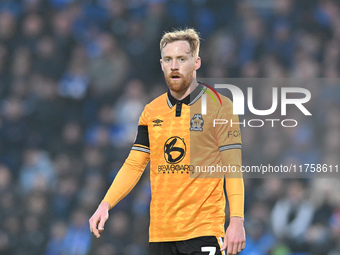 James Brophy (7 Cambridge United) looks on during the Sky Bet League 1 match between Peterborough and Cambridge United at London Road in Pet...