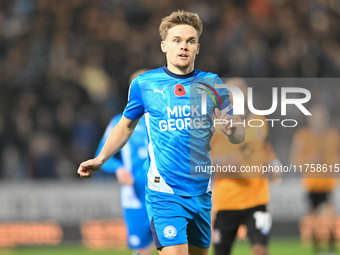 Archie Collins (4 Peterborough United) goes forward during the Sky Bet League 1 match between Peterborough and Cambridge United in Peterboro...