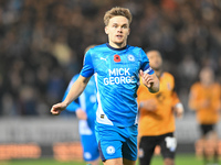 Archie Collins (4 Peterborough United) goes forward during the Sky Bet League 1 match between Peterborough and Cambridge United in Peterboro...