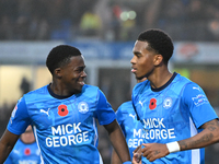 Malik Mothersille (7 Peterborough United) celebrates after scoring the team's fourth goal with Kwame Poku (11 Peterborough United) during th...