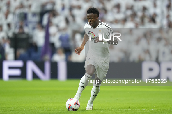 Vinicius Junior left winger of Real Madrid and Brazil during the La Liga match between Real Madrid CF and CA Osasuna at Estadio Santiago Ber...