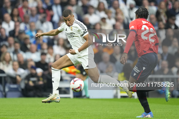 Kylian Mbappe centre-forward of Real Madrid and France during the La Liga match between Real Madrid CF and CA Osasuna at Estadio Santiago Be...