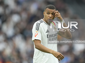 Kylian Mbappe centre-forward of Real Madrid and France reacts during the La Liga match between Real Madrid CF and CA Osasuna at Estadio Sant...