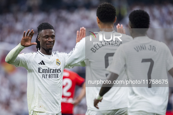 Jude Bellingham of Real Madrid CF celebrates his goal with Eduardo Camavinga (left) and Vinicius Junior (right) during the La Liga EA Sports...