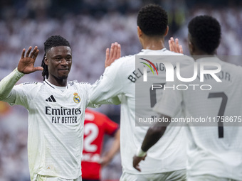 Jude Bellingham of Real Madrid CF celebrates his goal with Eduardo Camavinga (left) and Vinicius Junior (right) during the La Liga EA Sports...