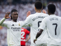 Jude Bellingham of Real Madrid CF celebrates his goal with Eduardo Camavinga (left) and Vinicius Junior (right) during the La Liga EA Sports...