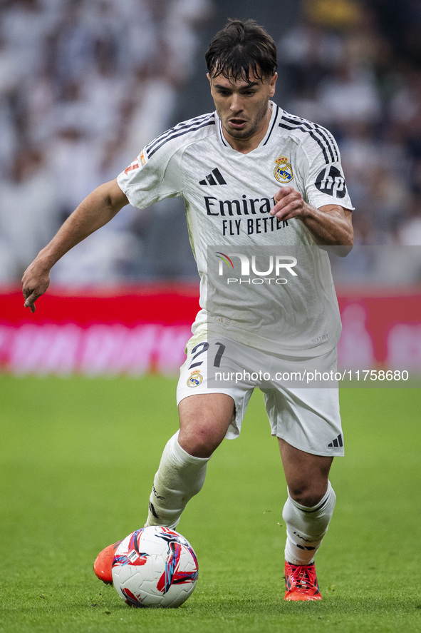 Brahim Diaz of Real Madrid CF is in action with the ball during the La Liga EA Sports 2024/25 football match between Real Madrid CF and CA O...