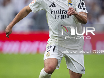 Brahim Diaz of Real Madrid CF is in action with the ball during the La Liga EA Sports 2024/25 football match between Real Madrid CF and CA O...