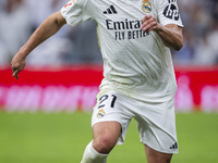 Brahim Diaz of Real Madrid CF is in action with the ball during the La Liga EA Sports 2024/25 football match between Real Madrid CF and CA O...