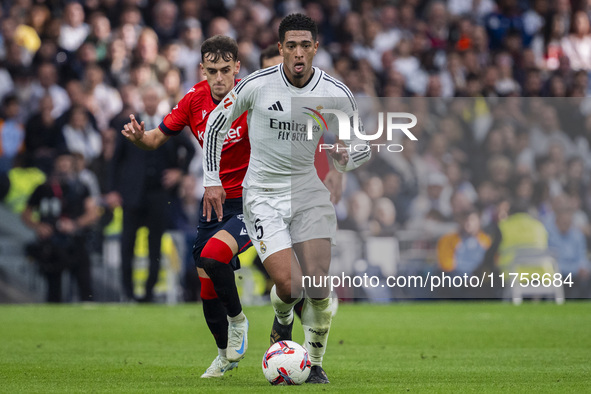 Jude Bellingham of Real Madrid CF is in action with the ball during the La Liga EA Sports 2024/25 football match between Real Madrid CF and...