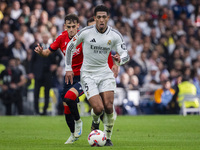 Jude Bellingham of Real Madrid CF is in action with the ball during the La Liga EA Sports 2024/25 football match between Real Madrid CF and...