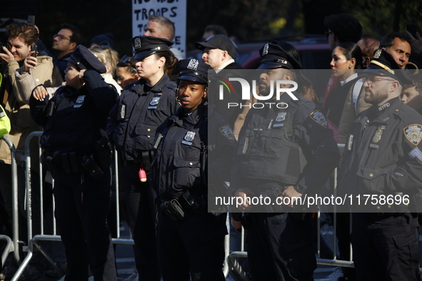 New York police are on high alert during an immigrant protest regarding imminent changes to immigration reforms in Manhattan, NY, on Novembe...