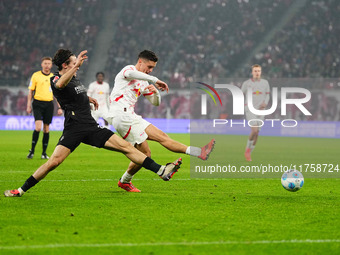 Christoph Baumgartner of Leipzig  shoots on goal during the Bundesliga match between RB Leipzig and Borussia Mönchengladbach at Red Bull are...