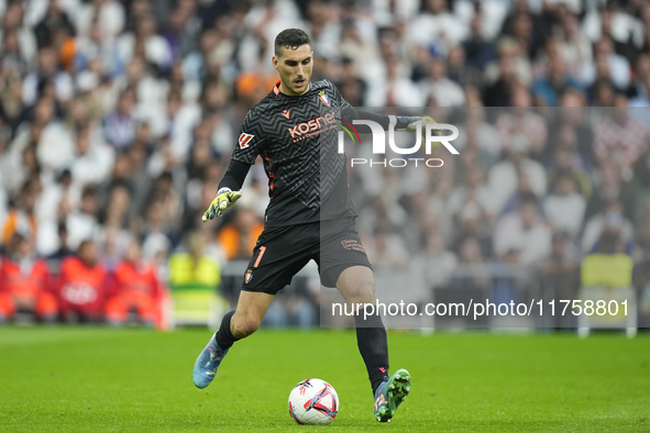 Sergio Herrera goalkeeper of Osasuna and Spain does passed during the La Liga match between Real Madrid CF and CA Osasuna at Estadio Santiag...