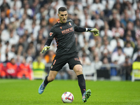 Sergio Herrera goalkeeper of Osasuna and Spain does passed during the La Liga match between Real Madrid CF and CA Osasuna at Estadio Santiag...