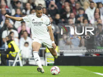 Kylian Mbappe centre-forward of Real Madrid and France shooting to goal during the La Liga match between Real Madrid CF and CA Osasuna at Es...