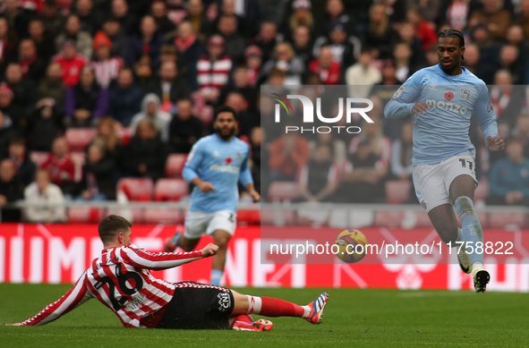 Sunderland's Chris Mepham tackles Coventry City's Haji Wright during the Sky Bet Championship match between Sunderland and Coventry City at...