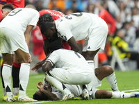 Eder Militao centre-back of Real Madrid and Brazil dejected lies injured on the pitch during the La Liga match between Real Madrid CF and CA...