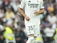 Raul Asencio centre-back of Real Madrid and Spain during the La Liga match between Real Madrid CF and CA Osasuna at Estadio Santiago Bernabe...